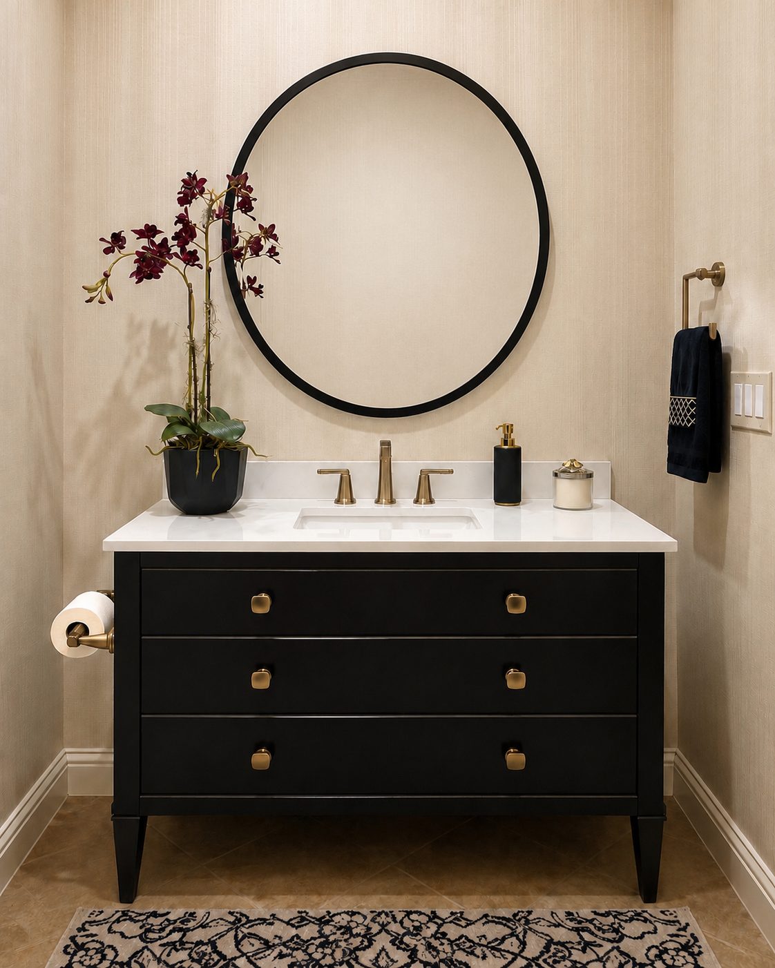 Powder room with a black furniture-style vanity, round black mirror and brass fixtures